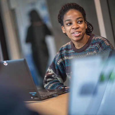 Woman in front of laptop